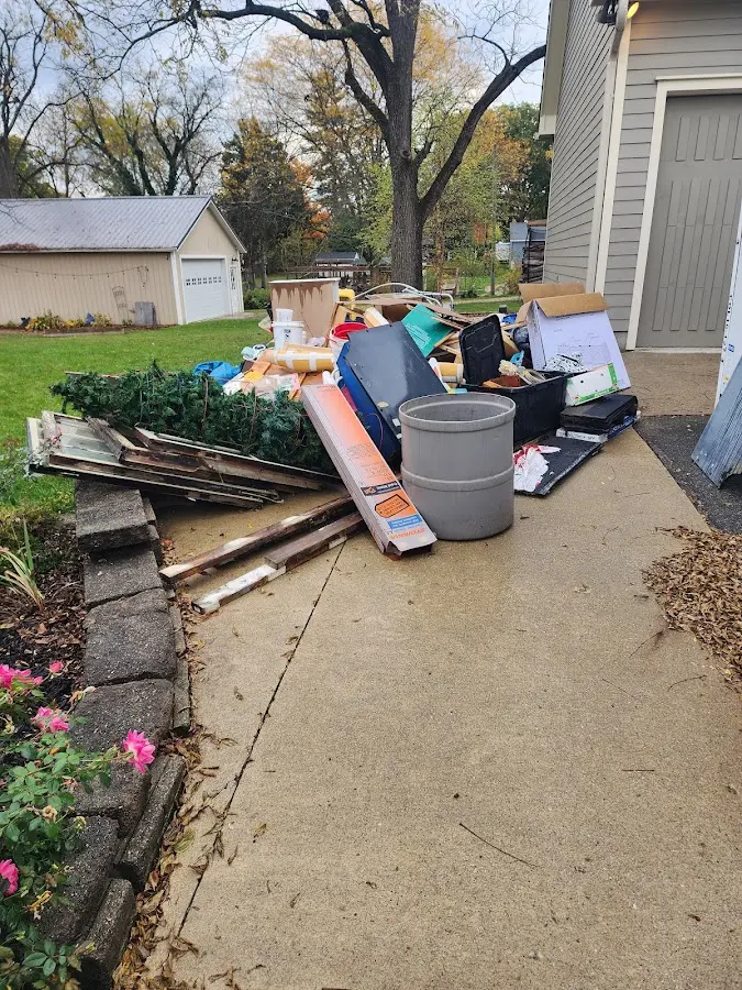 Dumpster being loaded with debris for 30 Yard Dumpster Rental in Aspen